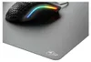 A black gaming mouse with RGB lighting sits on a gray mousepad with a white logo. Produktbild-Vorschau