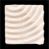 A square bar of soap with a textured, wavy pattern. Podgląd zdjęcia produktu