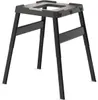 A black metal stand with adjustable legs, designed to hold an appliance. Anteprima dell’immagine prodotto