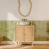 A bathroom vanity with a sink and mirror. Produktbild-Vorschau