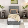 A bedroom scene with a single bed, nightstands, and a rug. Náhled obrázku produktu