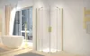 A modern bathroom with a bathtub, shower cabin, and a towel rack. Produktbild-Vorschau