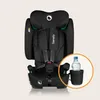 A black child car seat is shown against a light beige background. A circular inset highlights a cup holder with a water bottle in it. Produktbild-Vorschau