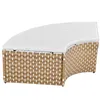 A curved outdoor bench with a white seat and a woven brown and white base. Voir les images du produit