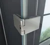 A close-up view of a shower hinge on a glass shower door. Produktbild-Vorschau