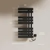 A black electric towel warmer mounted on a light-colored wall, with dimensions and specifications indicated by text and lines. Náhľad obrázku produktu