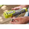 A person is holding a Ryobi compressor outdoors. Produktbild-Vorschau