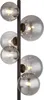 A floor lamp with multiple glass globes. Voir les images du produit