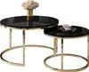 Two nesting coffee tables with black glass tops and gold chrome frames. Náhled obrázku produktu
