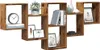 A wooden wall shelf unit with various decorative items. Náhled obrázku produktu