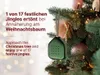 A green Christmas ornament with a speaker is hanging on a Christmas tree with lights and ornaments. Voir les images du produit