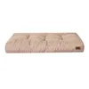 A beige dog mattress is shown from a side-angle on a white background. Voir les images du produit