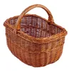 A woven basket with a handle, isolated on a white background. Produktbild-Vorschau
