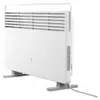 A white electric heater with a handle and legs, shown from a side angle against a white background. Produktbild-Vorschau
