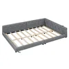 A grey upholstered daybed frame with wooden slats is shown from a diagonal angle against a white background. Produktbild-Vorschau