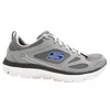 A side view of a gray Skechers athletic shoe with blue accents. Anteprima dell’immagine prodotto
