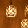 Close-up of a modern crystal chandelier with multiple light sources. Podgląd zdjęcia produktu