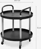 A two-tiered round serving cart with handles and wheels, shown against a white background with dimensions indicated. Anteprima dell’immagine prodotto