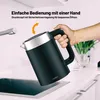 A hand is holding a black electric kettle over a sink, demonstrating its one-handed operation. Podgląd zdjęcia produktu
