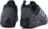 A pair of black and gray Adidas Terrex hiking shoes shown from the back and side. Produktbild-Vorschau