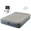 An inflatable air mattress with an integrated pump and a small instruction manual. Náhľad obrázku produktu