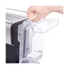 A hand is shown lifting the lid of a water tank on an espresso machine. Produktbild-Vorschau