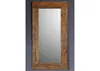A rectangular mirror with a wooden frame is shown against a gray background. Anteprima dell’immagine prodotto