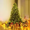 A decorated Christmas tree with presents underneath, illuminated by LED lights. Produktbild-Vorschau