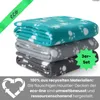 A stack of three folded pet blankets with paw print patterns in different colors. Produktbild-Vorschau