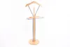 A wooden and metal valet stand against a white background. Anteprima dell’immagine prodotto