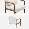 Two views of a cream-colored armchair with a wooden frame. Produktbild-Vorschau