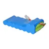 A battery pack with a blue wrapper and green cells visible at one end, with wires and a connector attached. Podgląd zdjęcia produktu
