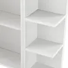 A close-up view of a white wall-mounted cabinet with multiple shelves. Produktbild-Vorschau