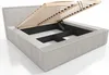 A bed frame with the mattress support lifted to reveal storage space underneath. Produktbild-Vorschau