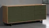 A modern sideboard with a wood top, green textured doors, and drawers against a gray wall. Podgląd zdjęcia produktu