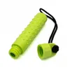 A bright green, textured, hollow cylinder with a cap and a string, isolated on a white background. Produktbild-Vorschau