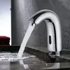 A modern bathroom sink with a chrome faucet dispensing water. Náhled obrázku produktu