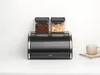 A black roll-top bread bin with two storage containers on top, placed on a white countertop. Podgląd zdjęcia produktu