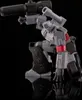 A gray and black robot toy, identified as Megatron from Transformers G1, is posed in a crouching stance, aiming a weapon. Podgląd zdjęcia produktu