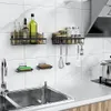 A kitchen scene with shelves holding spices and bottles, a sink with sponges, and a stove with a pot. Náhled obrázku produktu