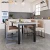 A modern kitchen and dining area with a table and chairs set. Anteprima dell’immagine prodotto