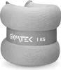 A close-up studio shot of a pair of gray weight cuffs. Náhled obrázku produktu