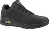 A black SKECHERS UNO women's sports shoe with gold accents is shown from the side against a white background. Voir les images du produit