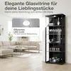 A living room scene with a sofa and a glass display cabinet. Produktbild-Vorschau