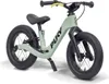 A light green balance bike with black wheels and seat, and yellow handlebar grips, is shown against a white background. Produktbild-Vorschau