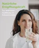 A woman drinks from a glass of water, with text overlay about detoxification. Produktbild-Vorschau