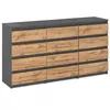 A modern dresser with 12 drawers, featuring a matte gray frame and Wotan oak drawer fronts. Podgląd zdjęcia produktu