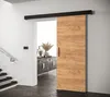 A sliding door in a modern interior, next to a staircase and a sideboard. Produktbild-Vorschau