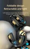 A pair of black and gold foldable headphones are displayed against a dark, abstract background with soft lighting. Produktbild-Vorschau