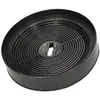 A black charcoal filter for a range hood, coiled into a circular shape with a central opening. Voir les images du produit